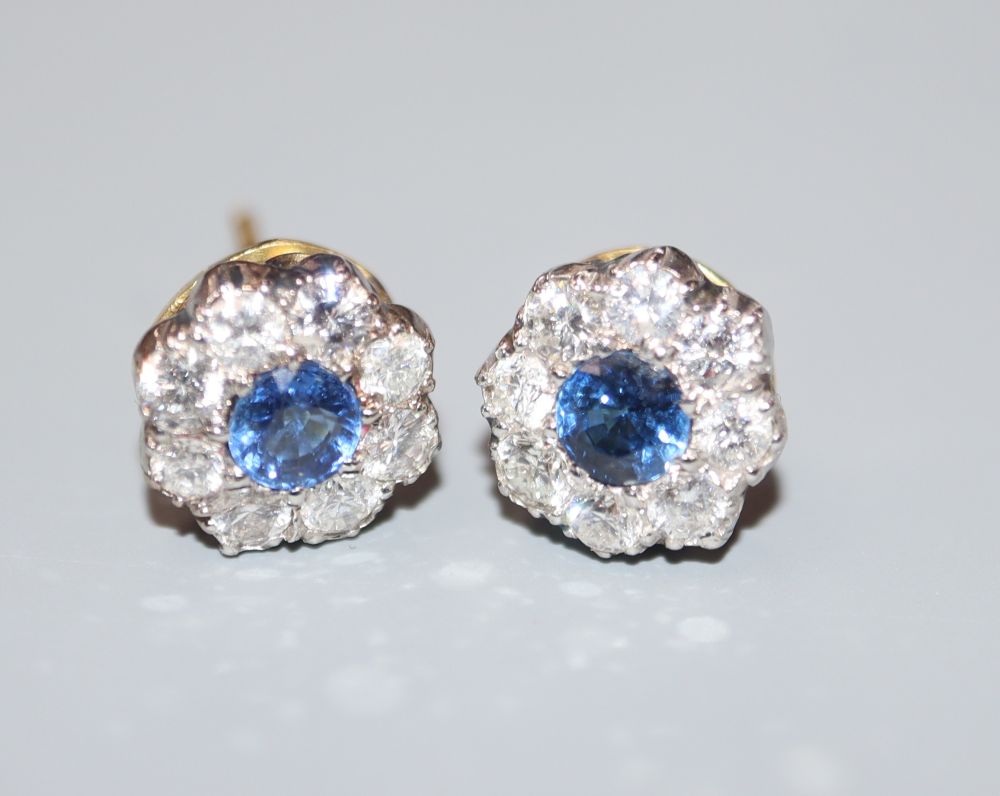 A modern pair of 750 yellow metal, sapphire and diamond set cluster ear studs, 8mm, gross 2.9 grams.